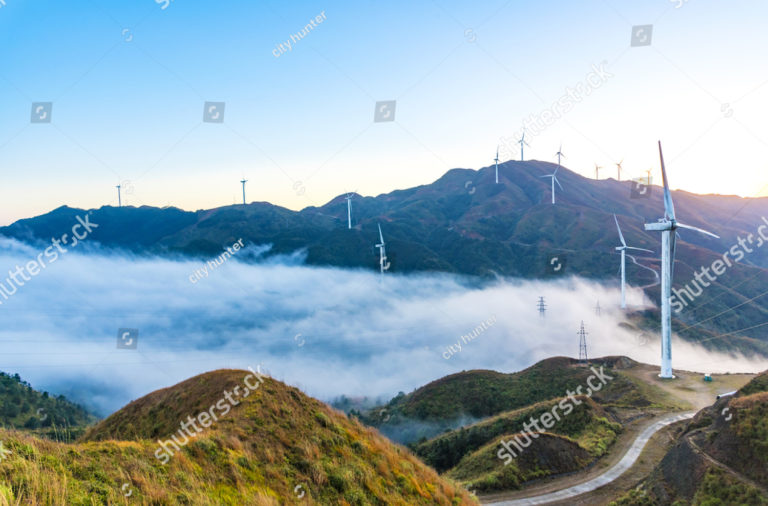 stock-photo-wind-power-generator-before-sunrise-sunset-550689607 (1)